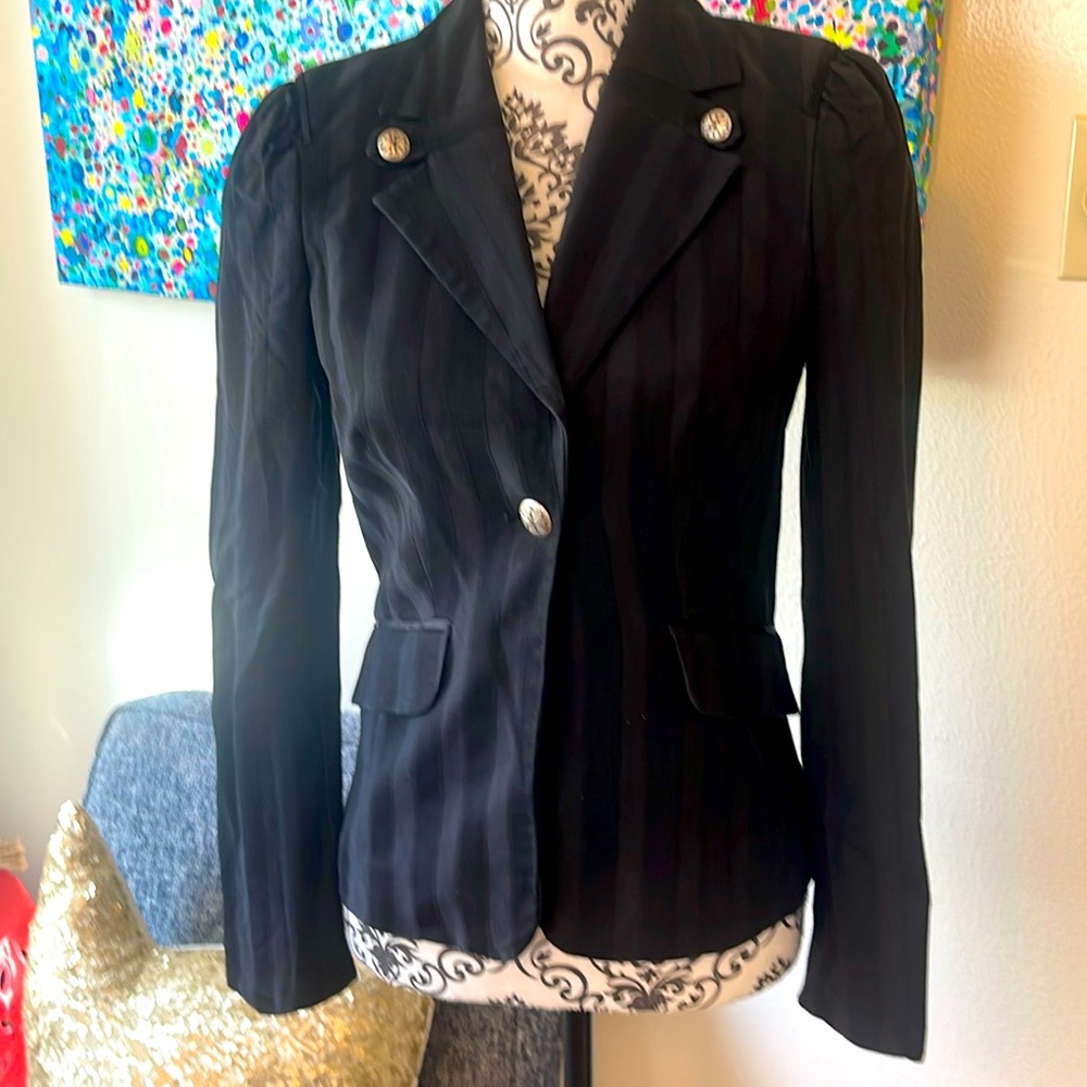 Designer gothic inspired coat from Spain with leather detailing,cool buttons